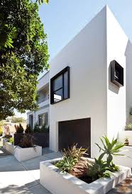 White Smooth Stucco Black Windows