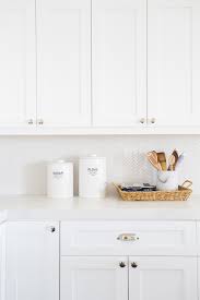 kitchen cabinets white or greige at