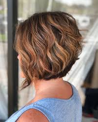 You may style your effortlessly gorgeous hair in a deep side part and sweep the elegant loose curls over one shoulder. 28 Cute Stacked Bob Haircuts Trending In 2021