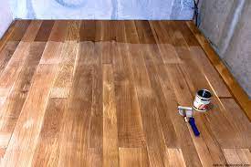 Applying polyurethane adds a protective coat to wood floors. Best Polyurethane For Floors Guide For Water Based Flooring Finishes