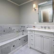 bathrooms 2x4 carrara marble tiles