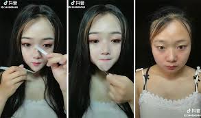 these asian women removing makeup will