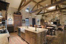 A barndominium is a metal structure that's combined with traditional barn space and are called barndos for short. Barndominium Long Gone Are The Days When Building Houses Was The Norm Large Modern Barndo Barn House Interior Metal Building Homes Barndominium Interior