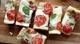 basil pesto  tomato  cheese and french bread melt