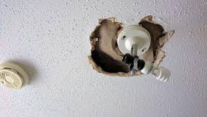 repairing a hole around light fixture