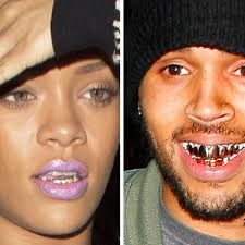 Chris brown is sporting a new neck tattoo: Rihanna Copies Chris Brown S Gold Teeth Amid Rumours They Re Getting Back Together Mirror Online