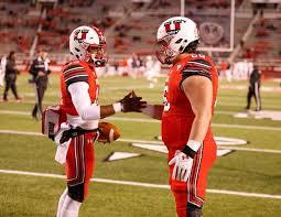 Two Utah Football Players Share A Handshake Prior To The