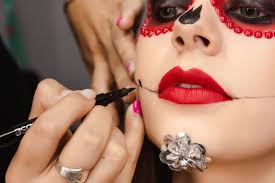 close up of a makeup artist drawing the