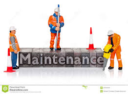 Maintenance Word In Letterpress With Miniature Workmen Stock Photo
