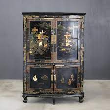 chinese corner cabinet in black lacquer