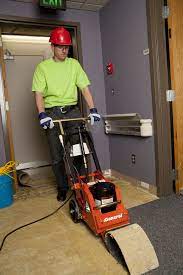 remove glued carpet or linoleum