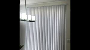 hang curtains over blinds without