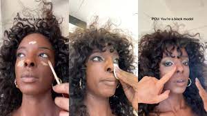 black model forced to do her own makeup