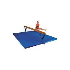 balance beam and a dismount mat