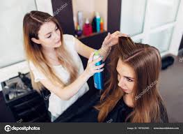 professional hairdresser using hair