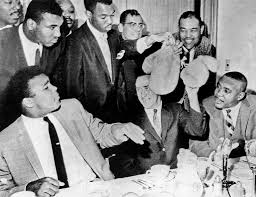 Image result for cassius clay and sonny liston sign to fight 1963