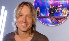 British version of the south korean singing competition/guessing game hit. Could Keith Urban Join The Masked Singer Australia Judging Panel In 2021 Daily Mail Online