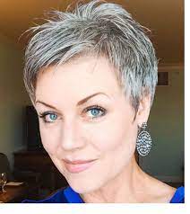This short cut, with hair brushed forward toward the forehead, is one example of a sleek short haircut for gray hair that is highly popular for mature women. New Design Spiky Short Haircut Fine Hair Hairstyles New Design Spiky Short Gray Haircut Haircut For Older Women Very Short Hair Short Grey Haircuts