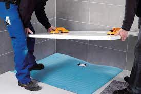 shower tray on a concrete floor