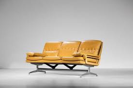 yellow leather sofa in the style of