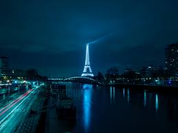 Eiffel tower is plunged into darkness to mark this year's earth hour. 120959 City Lights Cityscape Night Traffic Eiffel Tower 4k Reflections France Night Paris Mocah Hd Wallpapers