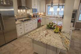 While the white granite on white cabinets look is plenty beautiful, there's something to be said for using darker granite with white cabinets. Top 5 Light Color Granite Countertops Marble Com