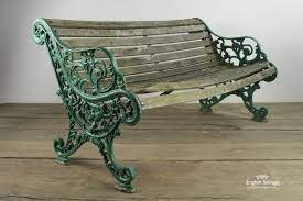 reclaimed slatted green wooden garden bench