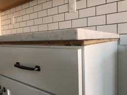 First, place dishwasher in its cavity and level it. Quartz W O Laminated Edge Scribe To Cover Plywood Pro Opinion Needed