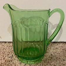 vintage green depression glass water