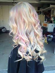 This is a nice way to just dip your toe into the trend of blonde hair with a pink highlight. Blonde With Pink Highlights Pink Blonde Hair Blonde Hair With Highlights Blonde With Pink Highlights
