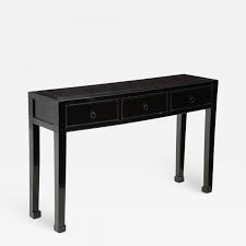 a chinese black lacquered console