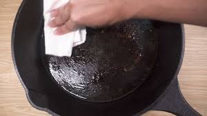 to clean a burnt cast iron skillet
