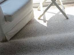 what causes carpet to buckle or ripple