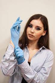 hands latex gloves in beauty studio