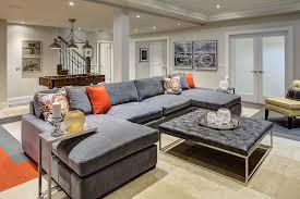Warm elements in cool spaces are an easy way to bring most basements aren't huge, so a unified colour palette (in this case black and white). Basement Family Room Ideas