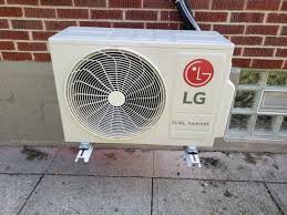 This wall mounted ductless setup system pairs a strong outdoor condenser with two wall mounted indoor units Ductless Mini Split Ac Services In Cincinnati Lg Excellence Contractor