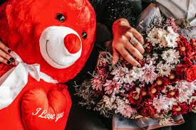 teddy bear and a bouquet