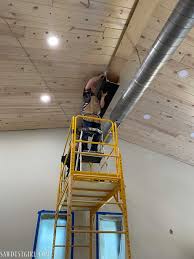 installing a giant faux beam on the ceiling