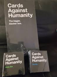 The bigger, blacker box at amazon.com. Cards Against Humanity Big Black Box With Green And Blue Box Expansions 1881792716