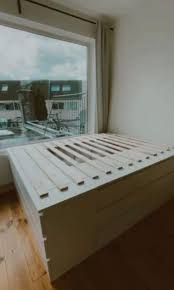 Woman Builds Bed From Ikea Drawers In A