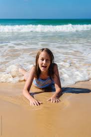 Original scans, photographs, pictures, video captures of young male stars, actors, singers, teen idols, boy celebrities, teens, entertainment news. Young Teen Lying In The Surf By Gillian Vann Surf Beach