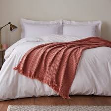 dunelm pink bed throws off 64