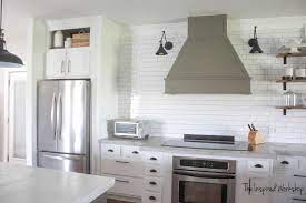 You need to make sure that you are using your level while you are building so that your cabinet is even with the wall and floor. Building A Cabinet Above The Fridge Kitchen Renovation The Inspired Workshop