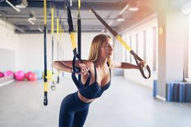 gym upper body exercise concept on trx