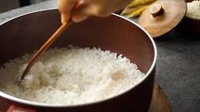 How do I Fluff rice with a fork?