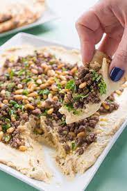 Mix oil, cumin, coriander, cayenne, salt and pepper in a small bowl. Hummus With Ground Lamb And Toasted Pine Nuts The Lemon Bowl