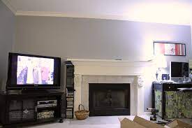 built in fireplace and tv side by side