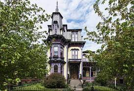 Classic victorian with recently replaced mansard roof and fresh exterior paint. Second Empire Victorian With Soaring Turret Mansard Roof