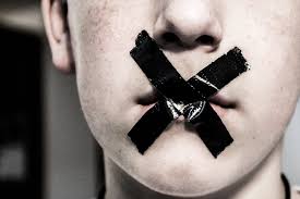 silence | teenage boy with black duct tape over his mouth | Rebecca Barray  | Flickr