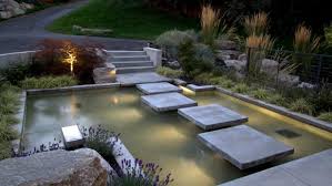 Shimmering Garden Pond With Stepping